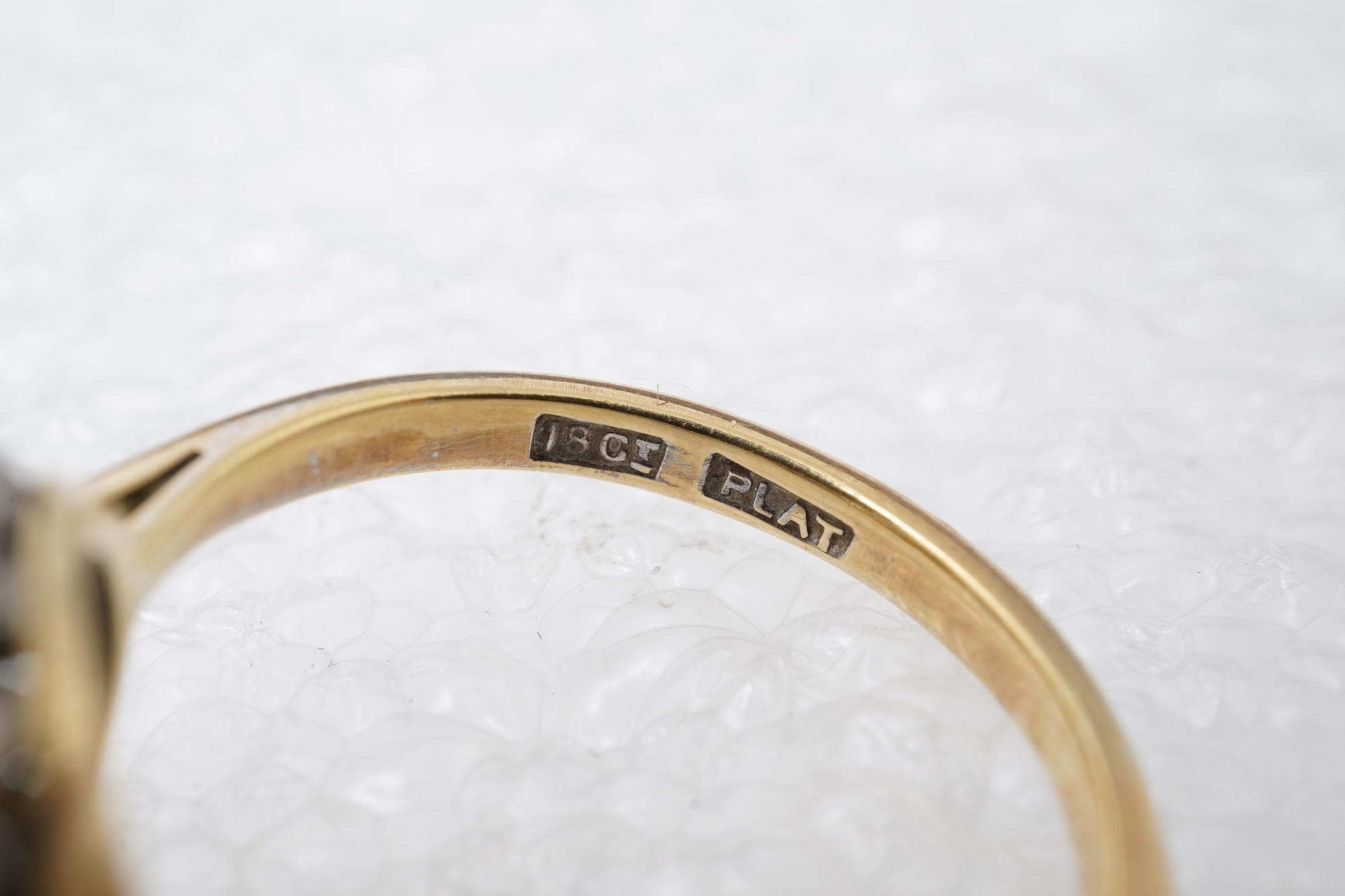 A diamond cluster ring